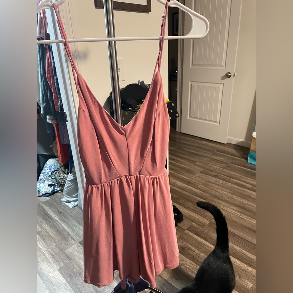 Pink romper. XS. New.